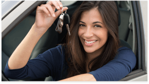 Woman in car holding car keys