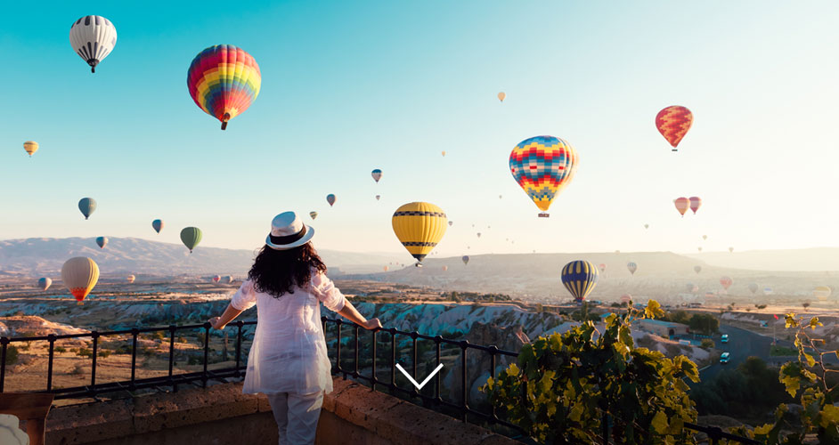 Woman watching hot-air ballon festival