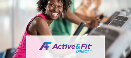 Active & Fit Direct. A woman at the gym on workout machine