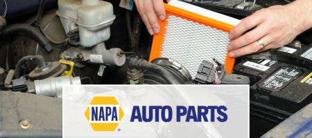 NAPA Auto Parts. NAPA mechanic switching out filter.