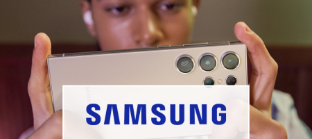 Samsung logo over an image of a man using a smartphone